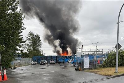 Surrey firefighters battle blaze at Super Save